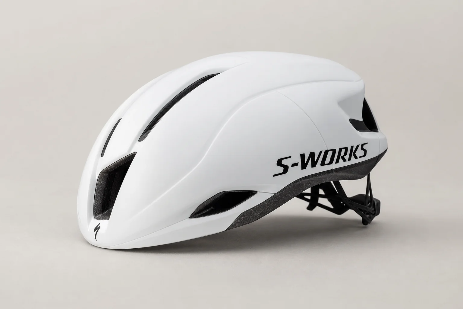 Six aerodynamic road cycling helmets arranged on concrete surface