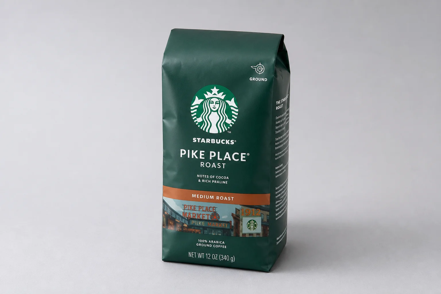 Five grocery store coffee brand bags arranged on concrete surface