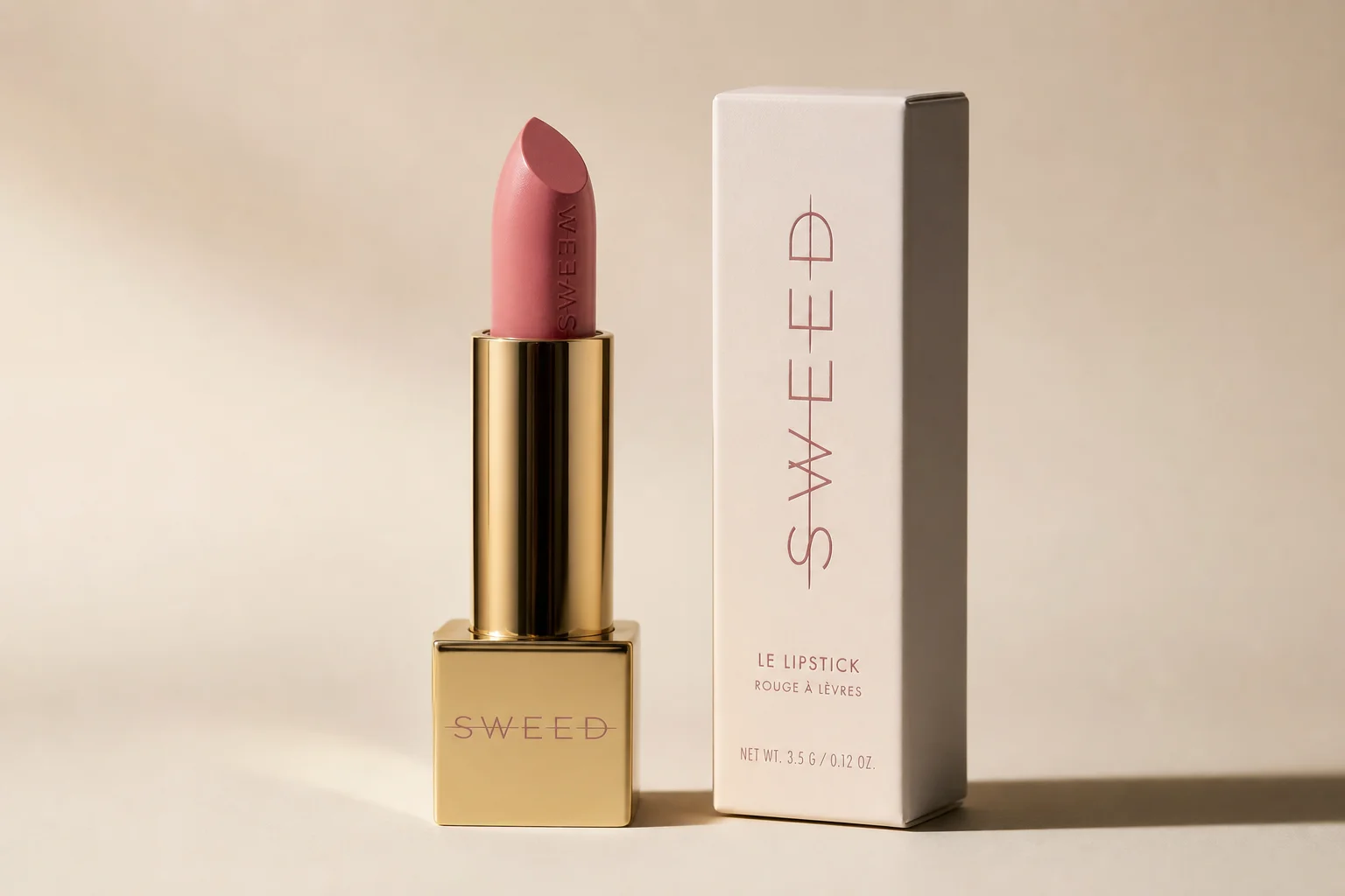 Sweed Beauty makeup collection arranged on concrete surface showing foundation, powder, blush, lipstick, and mascara
