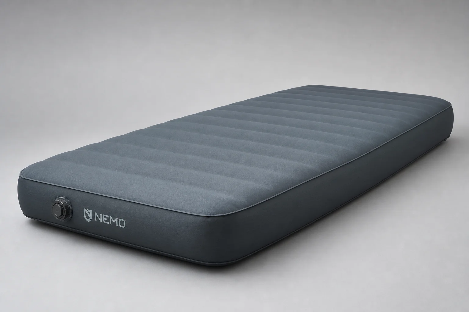 Therm-a-Rest NeoAir and OEX Traverse sleeping pads side by side showing thickness contrast