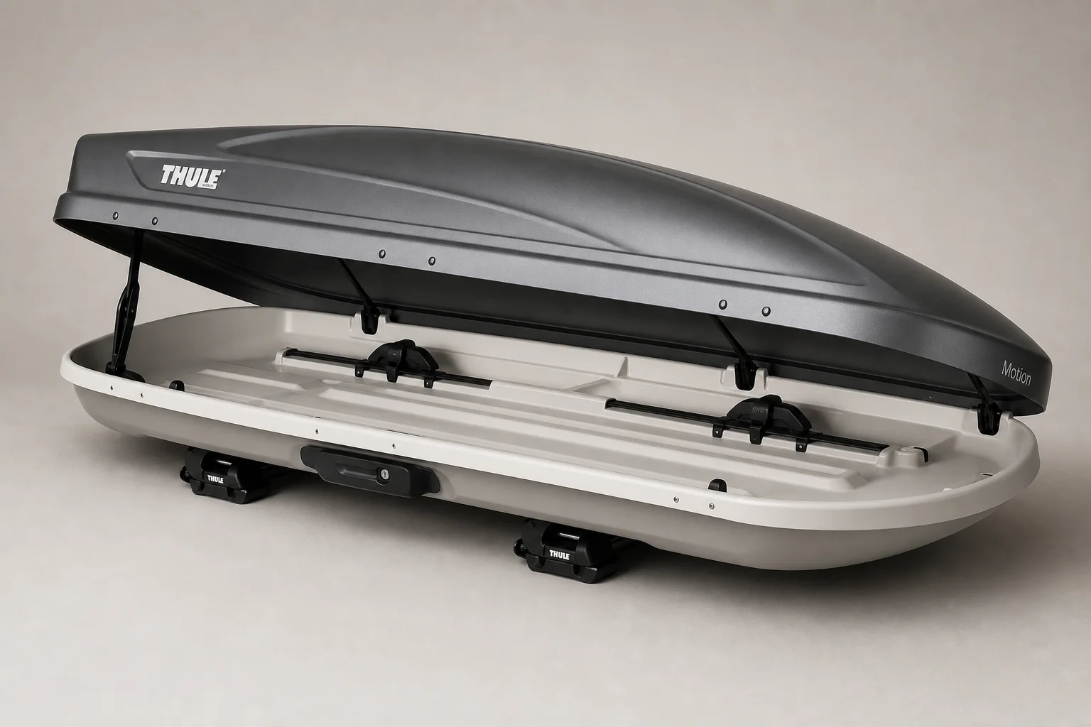 Rooftop cargo box mounted on vehicle roof rack with aerodynamic design