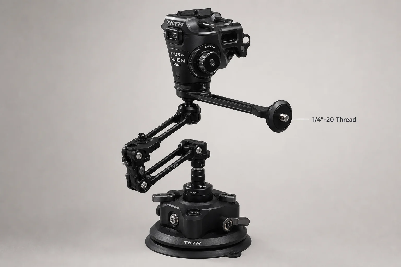 DJI Action 5 Pro in Tilta metal cage with side handle, phone mount, and ND filter