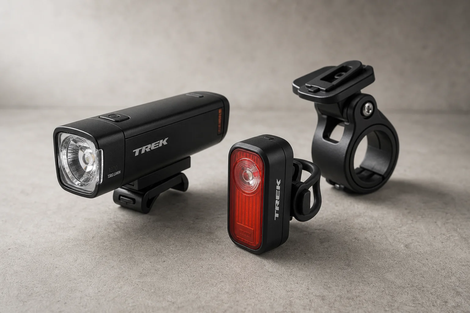 Trek Commuter Pro RT, Commuter Comp, and Flare RT lights on concrete surface
