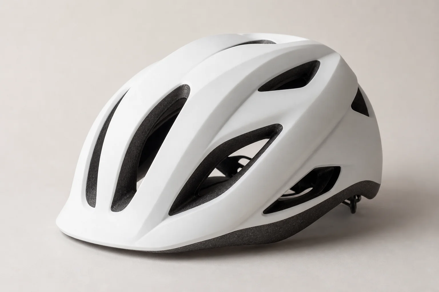 Three cycling helmets arranged side by side: Van Rysel RCR, Met Trenta, and Kask Protone