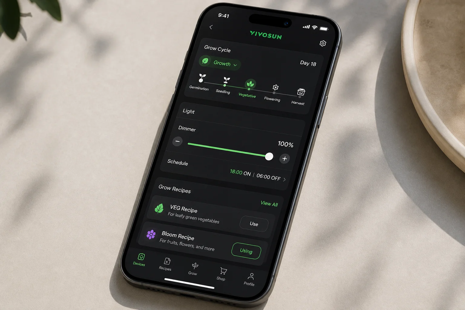 Smartphone displaying VIVOSUN app interface with grow cycle settings