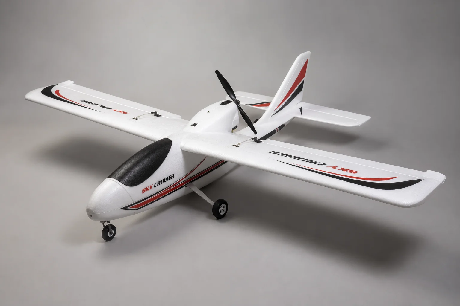 Five beginner RC planes displayed on neutral backdrop