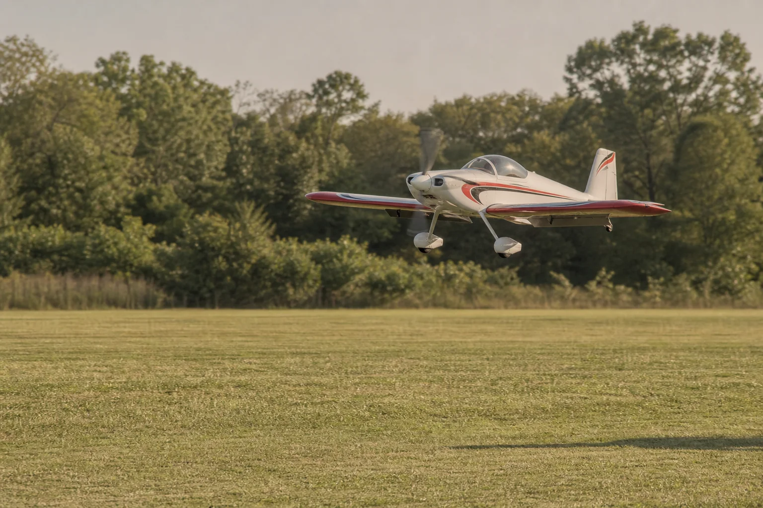 RC aircraft on final approach with landing gear extended