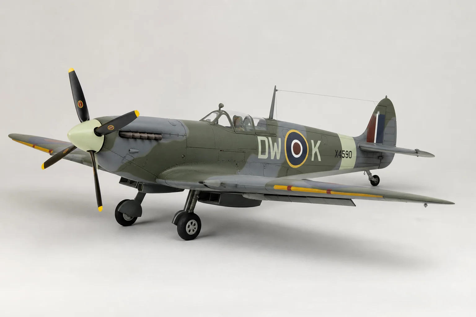 Xfly Spitfire RC warbird in RAF livery with landing gear and flaps visible