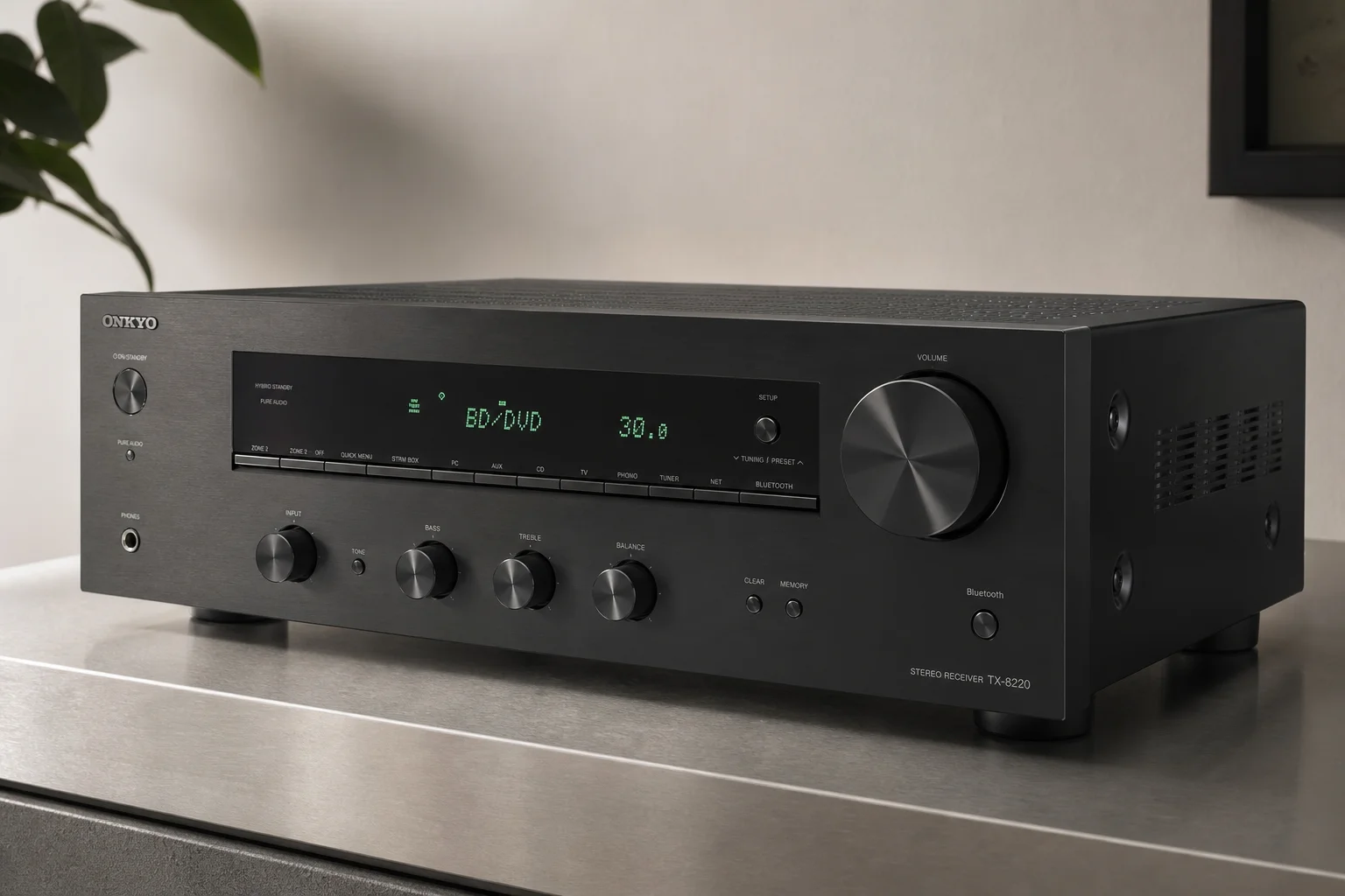 Six stereo receivers arranged on concrete surface showing various sizes and designs